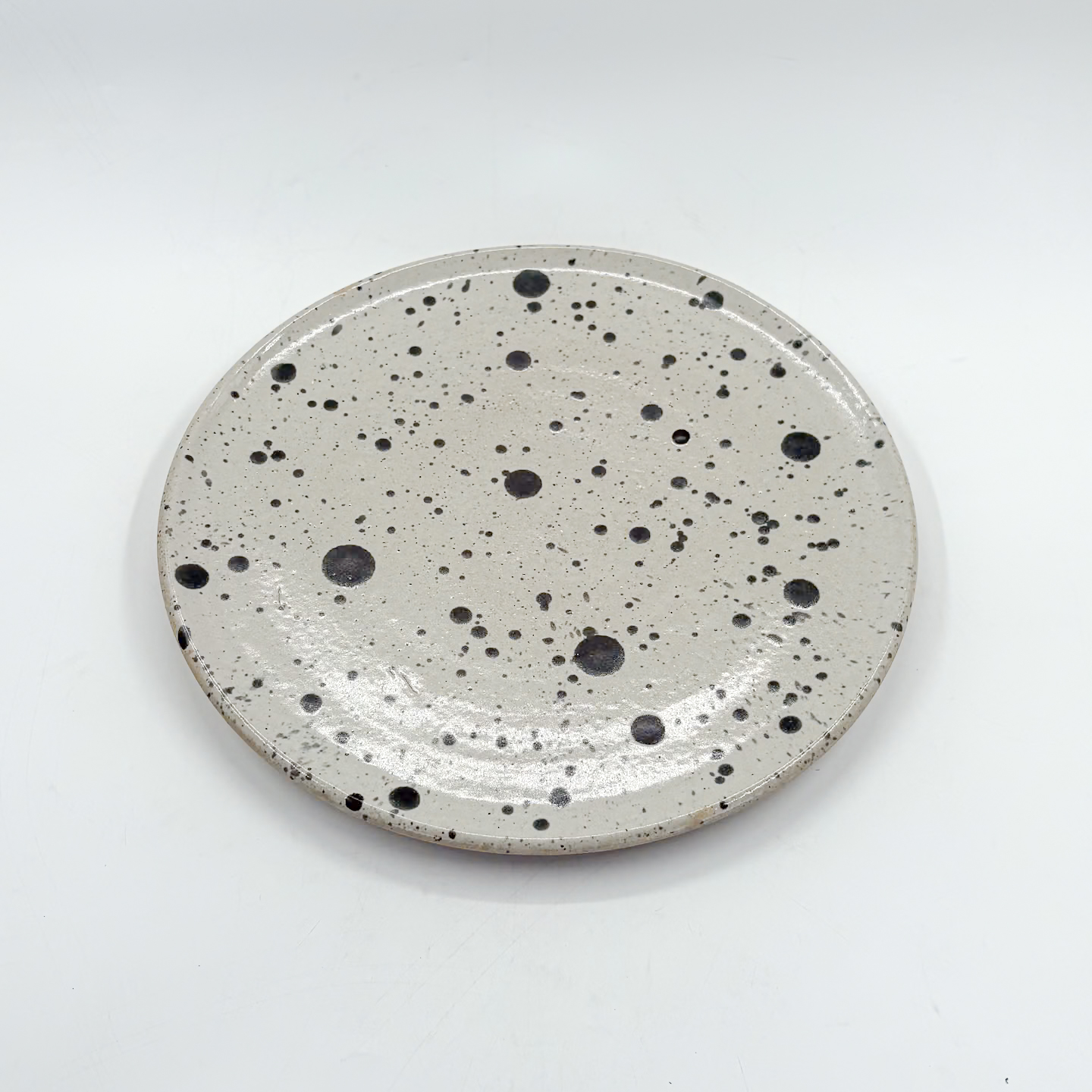 Plato Plano 28cm-Blanco Jaspeado Negro